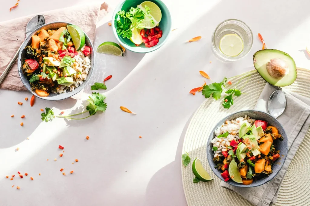 A beautifully plated dish illuminated by natural sunlight streaming through a window.