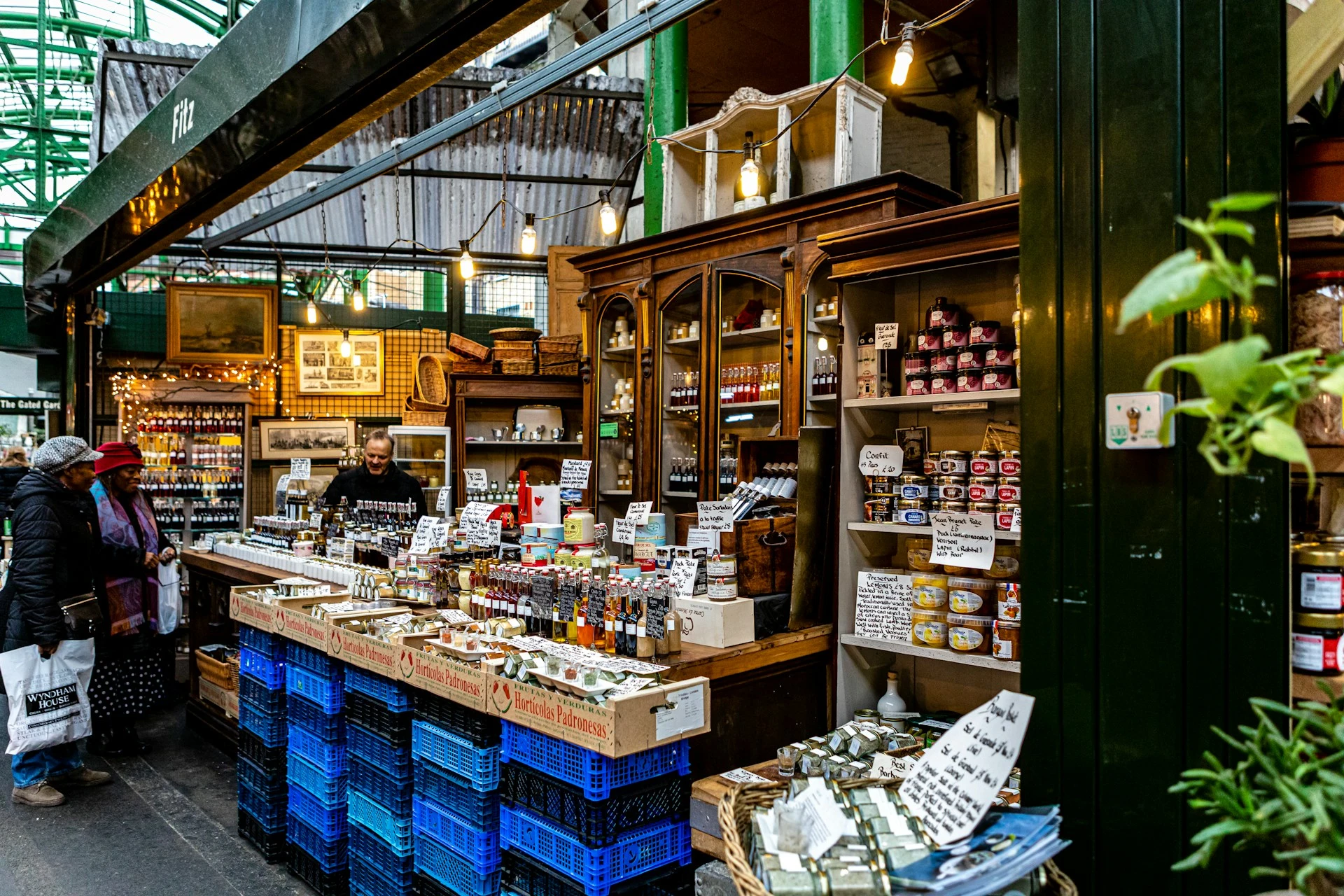 A bustling food market with stalls selling fresh produce, local delicacies, and handmade goods.