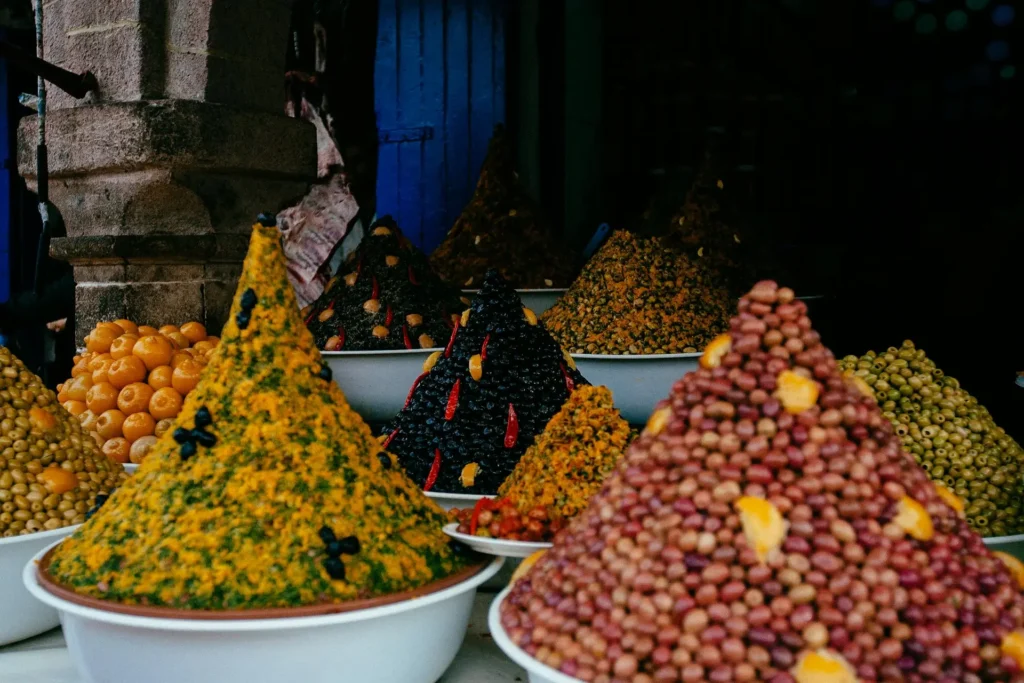 A traditional Moroccan tagine dish filled with meat, vegetables, and aromatic spices.