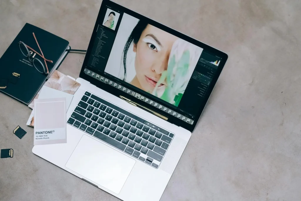 A digital workspace with a food photograph on a computer screen and various editing tools in use.